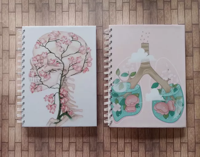 Dos cuadernos tapa anatomía 