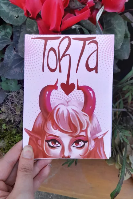 Fanzine titulado "Torta" con un personaje femenino en la portada.