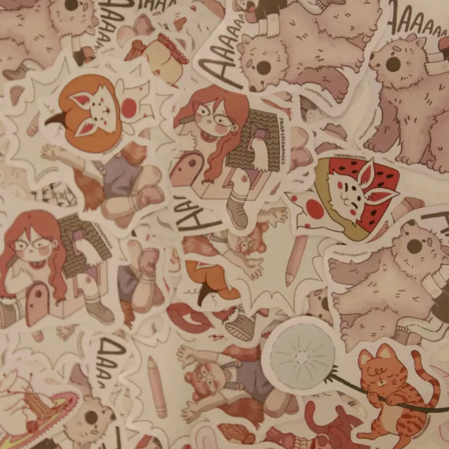 La imagen son muchos diseños de stickers apilados.